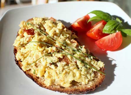 Saarländische Eierschmeer, Eggs and bacon scramble on toast Saarland style 