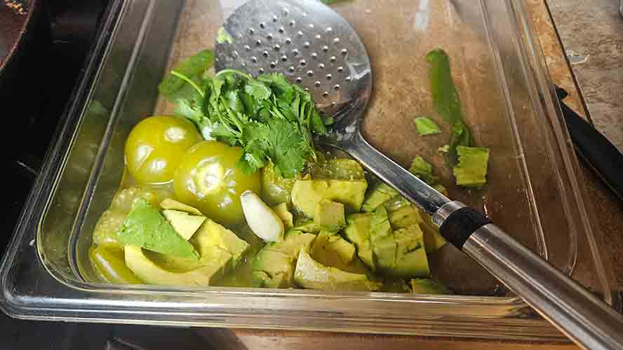 Cooked green sauce ingredients.